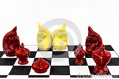 Two of white horse Chess charactor around with red enemy Stock Photo