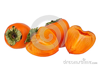 Two orange persimmons fruits or diospyros kaki and two halves of one persimmon on white background isolated close up Stock Photo