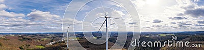 Wind wheels in an bright cloudscape high definition panorama Stock Photo