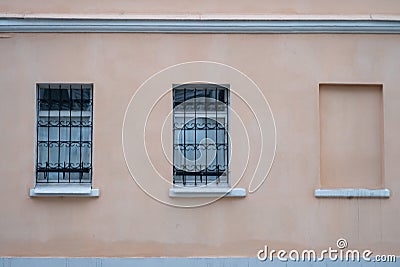 Windows of an old one-storey Moscow house, a mortgaged window, minimalism Stock Photo