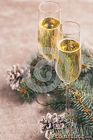 Two wineglasses of champagne with Christmas tree branches Stock Photo