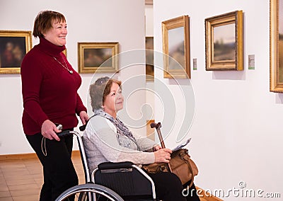 Two woman in art gallery Stock Photo