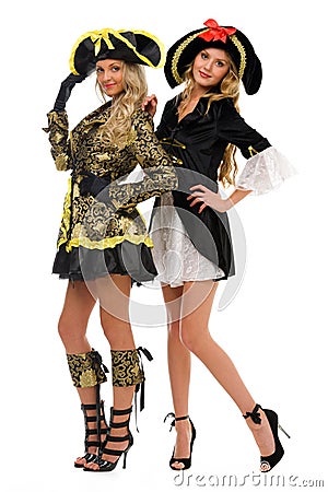 Two women in carnival costumes. Pirate and empress Stock Photo