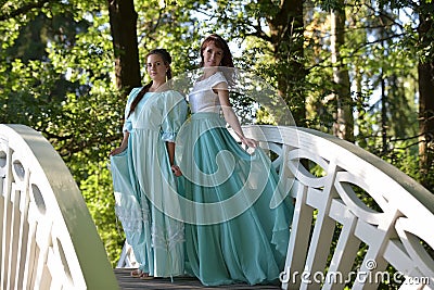 Two women in evening dresses Stock Photo