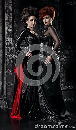 Two women in fetish costumes Stock Photo