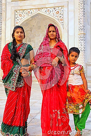 Two women and a girl standing outside Taj Mahal in Agra, Uttar P Editorial Stock Photo