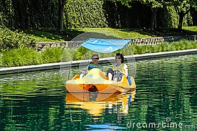 Two women in a peddle-boat Editorial Stock Photo