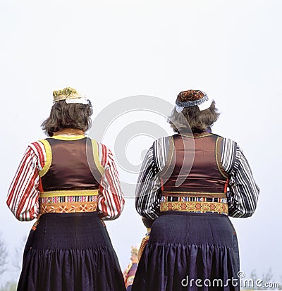 Two women in traditional costume at Marken, Holland Stock Photo