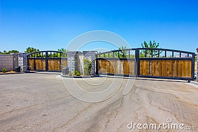 Two Wooden And Metal Automatic Entry Gates Stock Photo
