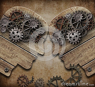 Two wooden heads with gears coming into collision concept Stock Photo