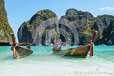 Two wooden traditional boats on the shore Stock Photo