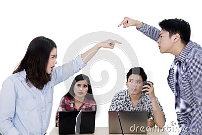 Two workers accusing each other on studio Stock Photo