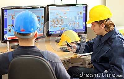 Two Workers in a Control room Stock Photo