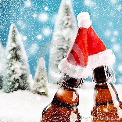 Two xmas beer bottles clink together Stock Photo