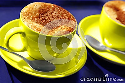 Two yellow coffee cups Stock Photo