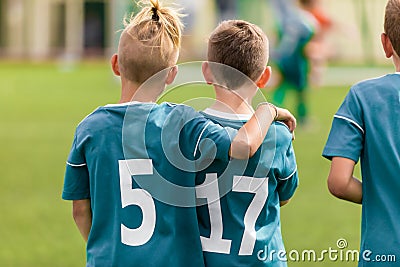 Two young boys as a teammates in sports team. Friendship in junior sport Editorial Stock Photo