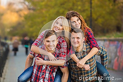 Two young couples spend time in the Park Stock Photo