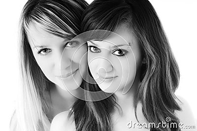 Two young girls isolated on white Stock Photo