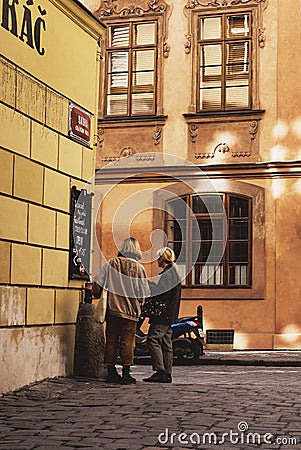 two young girls on the tourist streets of Prague Editorial Stock Photo