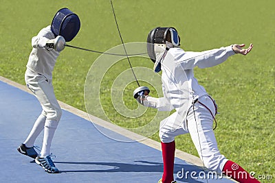 Two young man fencing athletes fight Stock Photo