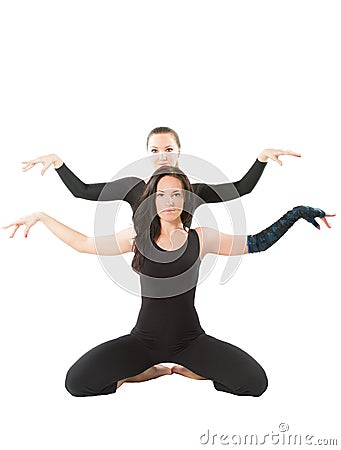 Two young women make stretch on yoga pose Stock Photo