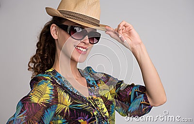 Tylish woman wearing hat and sunglasses Stock Photo