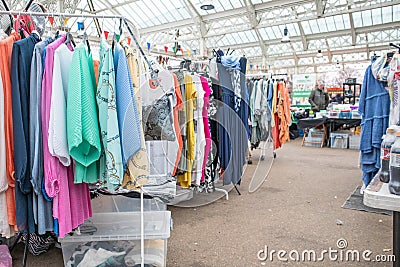 Tynemouth Metro Station Weekend Flea Market. Stall selling womens ladies clothing Editorial Stock Photo