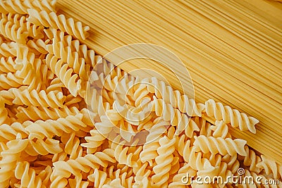 Types of pasta on full frame. shapes of handmade pasta. real life atmosphere. from durum wheat homemade pasta . Mediterranean Stock Photo