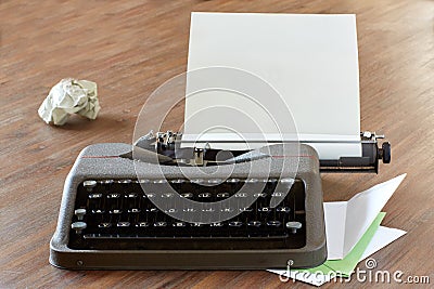 Typewriter on a table with letterhead paper Stock Photo
