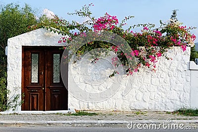 A typical Aegean stonehouse's facade Stock Photo