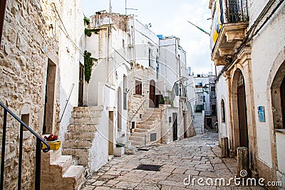 Typical alley in beautiful small town of Cisternino, Apulia Stock Photo