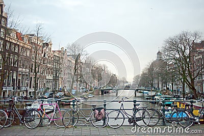 Typical Amsterdam canal and bicycle Editorial Stock Photo