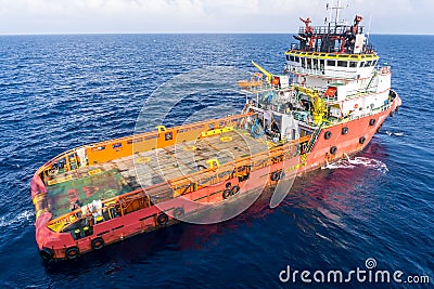 A typical anchor handling tub boat at oil field Stock Photo