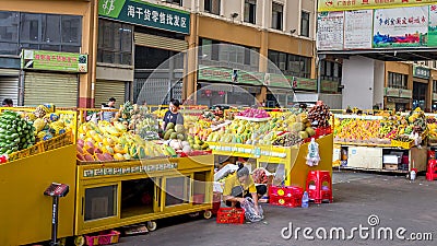 Typical Asian fruit market. Fresh tropical fruits are on the market window. Healthy, organic food Editorial Stock Photo