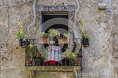 Typical balcony that distills the Italian folklore style Stock Photo