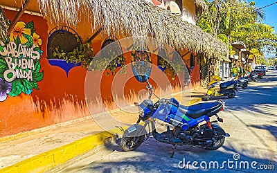 Typical beautiful colorful tourist street sidewalk city Puerto Escondido Mexico Editorial Stock Photo