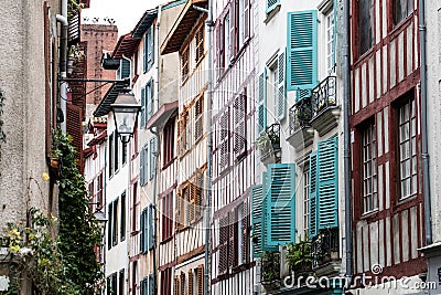 Typical beautiful street with colorful timbers and blinds for tourism Stock Photo