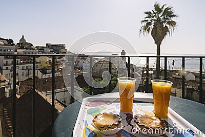 Typical breakfast with Pasteis de Belem in Lisbon Stock Photo