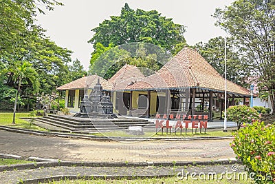 a typical building of the Klaten district and a temple located in Maerakaca Park, Semarang Stock Photo
