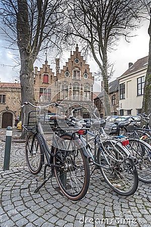 Typical buildings and cobbled square in Bruges Editorial Stock Photo