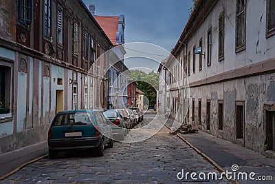 Typical central european and eastern european street in Petrovaradin, Serbia, next to novi sad, in a residential vintage area with Stock Photo