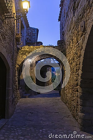cobbled street of the town of pals in the spanish costa brava at night Stock Photo