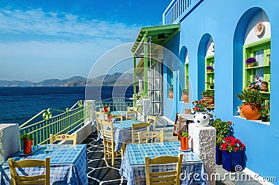 Typical colorful Greek restaurant, Kalymnos, Dodecanese Islands, Greece Stock Photo