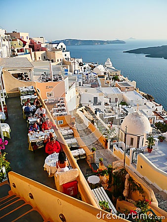 Restaurants on the Santorini Caldera at Sunset, Greece Editorial Stock Photo