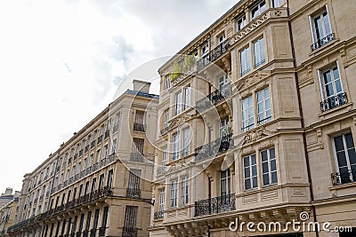 Typical design of Parisian architecture hausmann facade of french building in block of apartments in bordeaux France Stock Photo