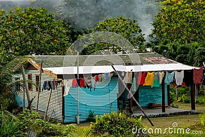 Typical fijian house in Lavena village on Taveuni Island, Fiji Stock Photo