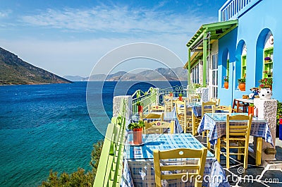 Typical Greek restaurant on the balcony, Greece Stock Photo