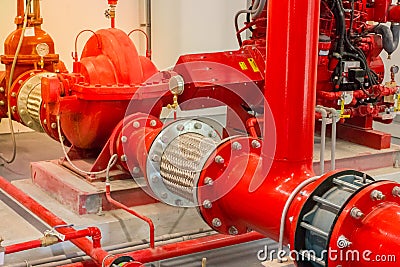 Typical installation of fire pump room with approved pump nd valve connect to pipe with stainless flexible pipe. Stock Photo