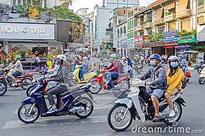 Typical intersection of Vietnamese streets with a lot of mopeds Editorial Stock Photo