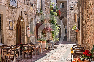 Typical Italian restaurant in the historic alley Stock Photo